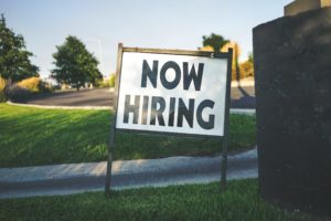 now hiring sign for compensation manager